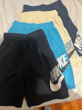 Nike boys shorts 
4 shorts all same size Large (boys)